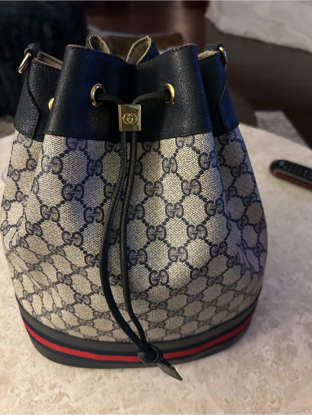 Gucci Beige GG Canvas Bucket Bag with Black Trim and Red-Blue Stripe - Picture 2 of 3
